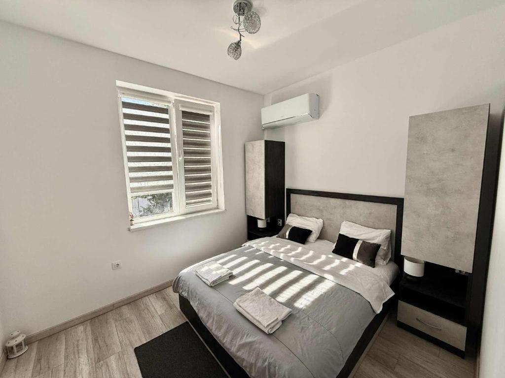 Ένα ή περισσότερα κρεβάτια σε δωμάτιο στο Sky