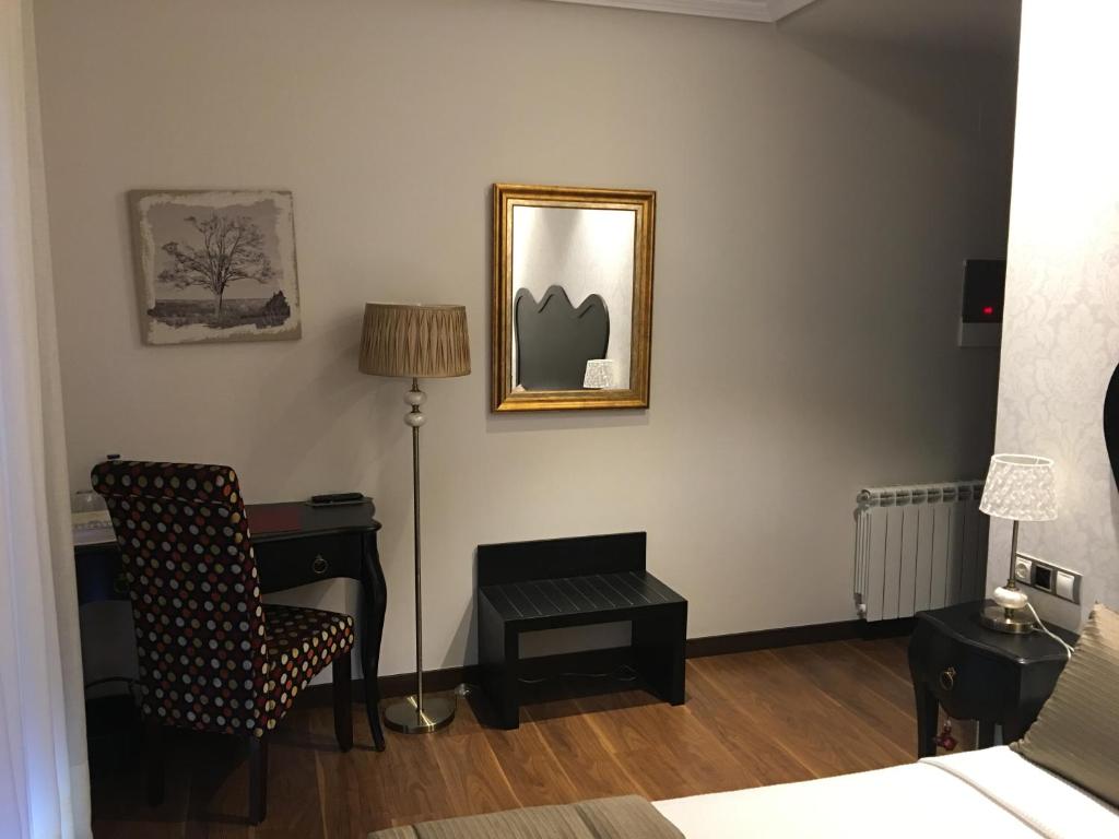 Postel nebo postele na pokoji v ubytování Hotel Calzada