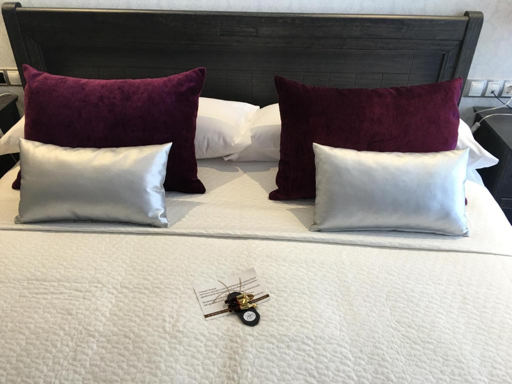 Postel nebo postele na pokoji v ubytování Hotel Calzada