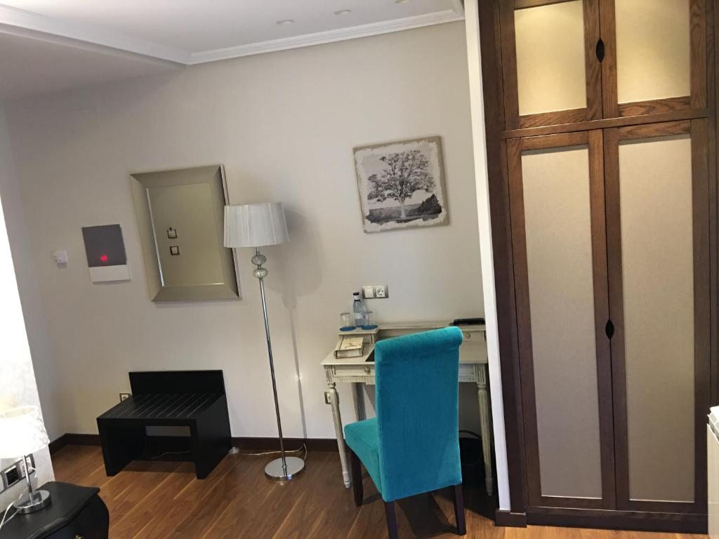 TV a/nebo společenská místnost v ubytování Hotel Calzada