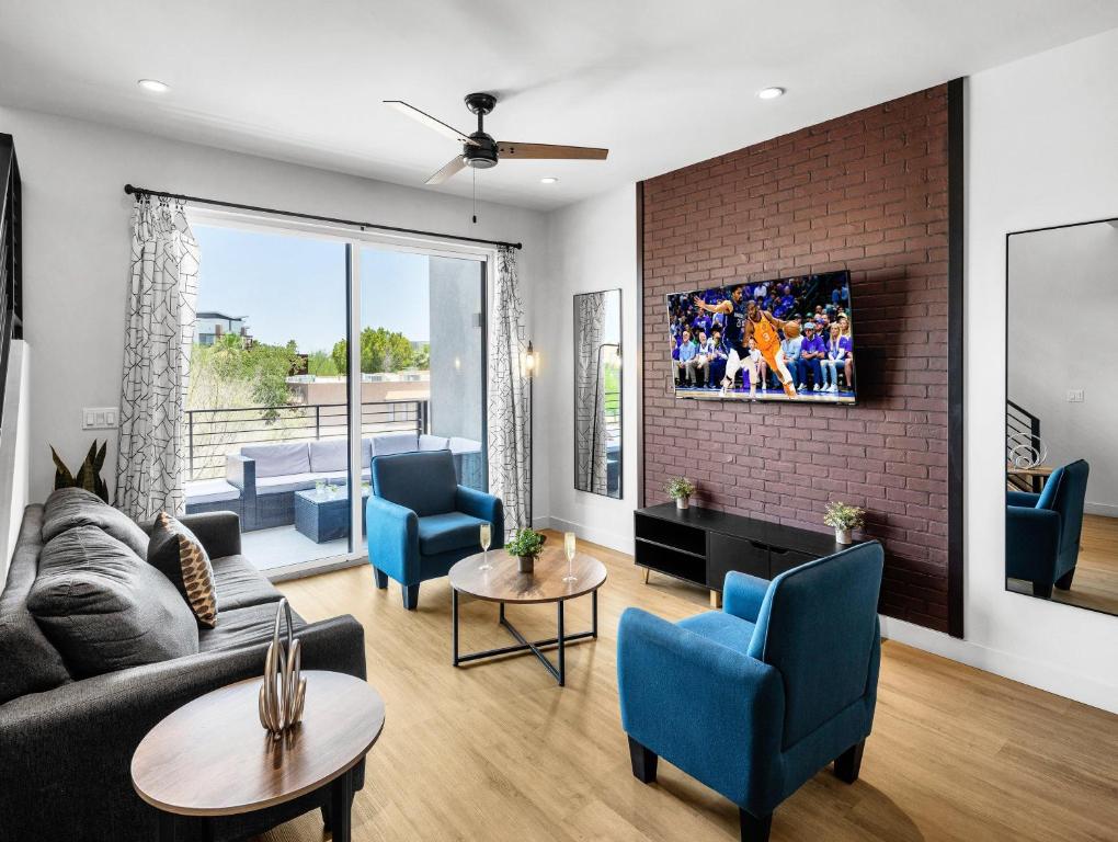 a living room with a couch and chairs at Thunderbird - 4 Units - Jacuzzi - In Old Town in Scottsdale