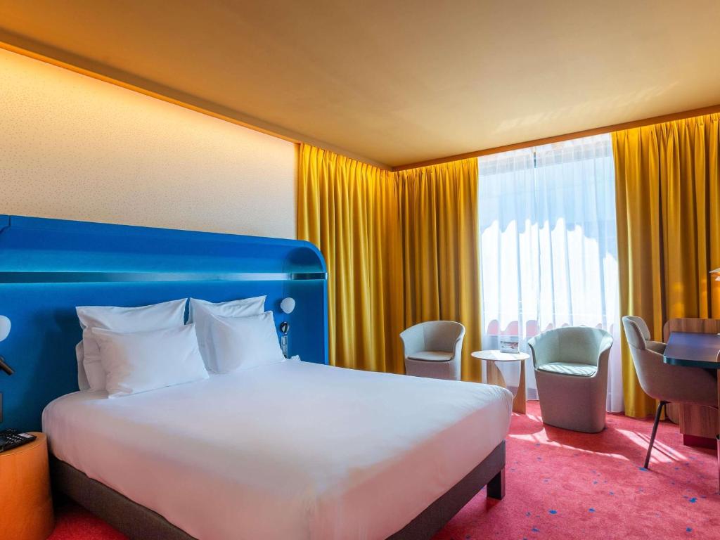 Кровать или кровати в номере Mercure Warszawa Centrum