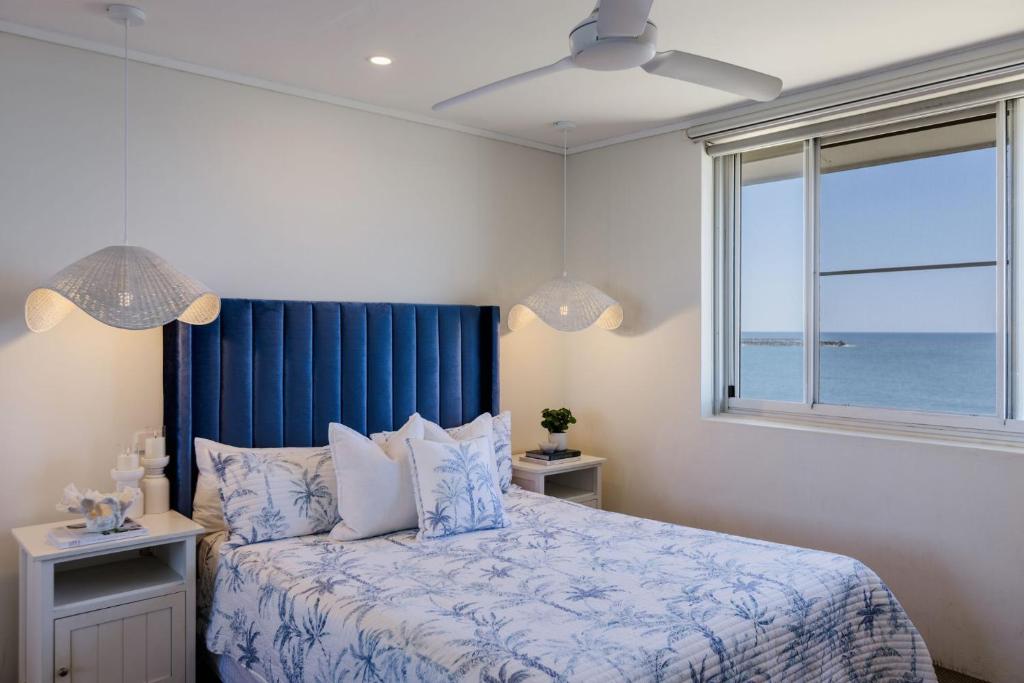 Ένα ή περισσότερα κρεβάτια σε δωμάτιο στο Craigmore Penthouse - Endless Ocean Views