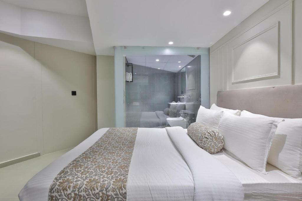 Katil atau katil-katil dalam bilik di Shrine Suites