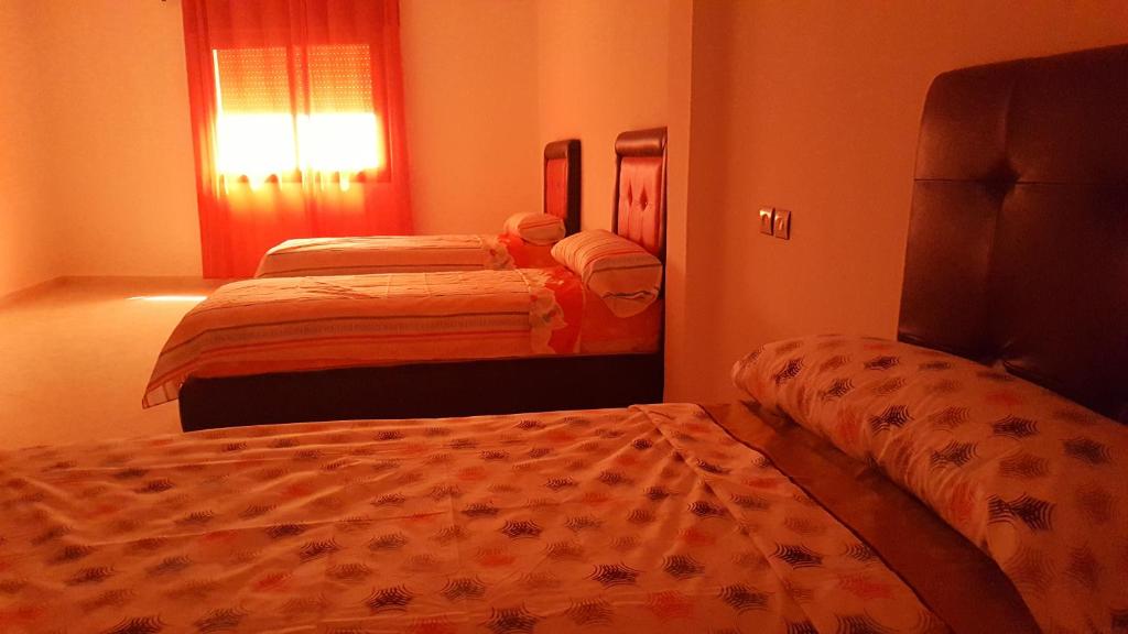 Postel nebo postele na pokoji v ubytování Oued Laou Apartment