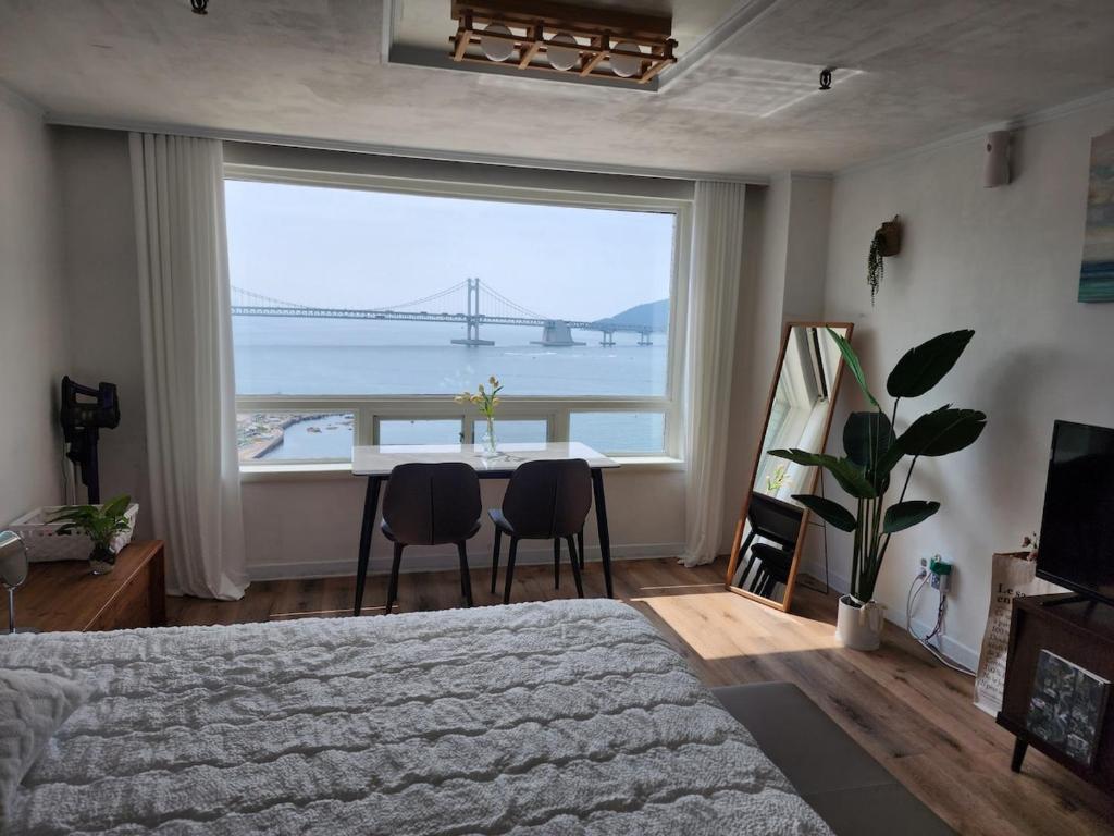 Ένα ή περισσότερα κρεβάτια σε δωμάτιο στο Dohi