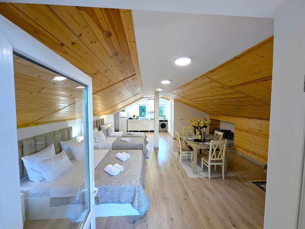 a living room and dining room of a house at Bodokia winery and guesthouse in Gegut'i