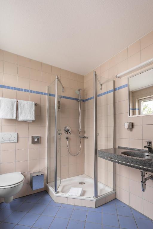 Koupelna v ubytování Kurhaushotel Bad Salzhausen