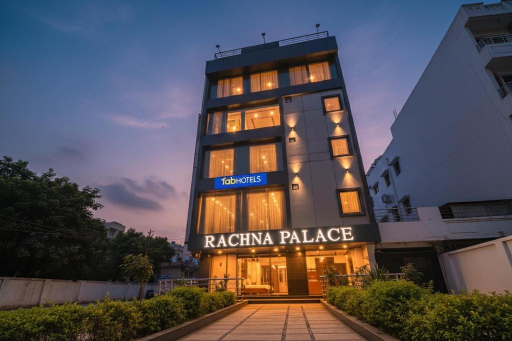 a building with a sign that reads raaja palace at FabHotel Rachna Palace and Banquets - Nr Lekhraj Metro Station in Lucknow