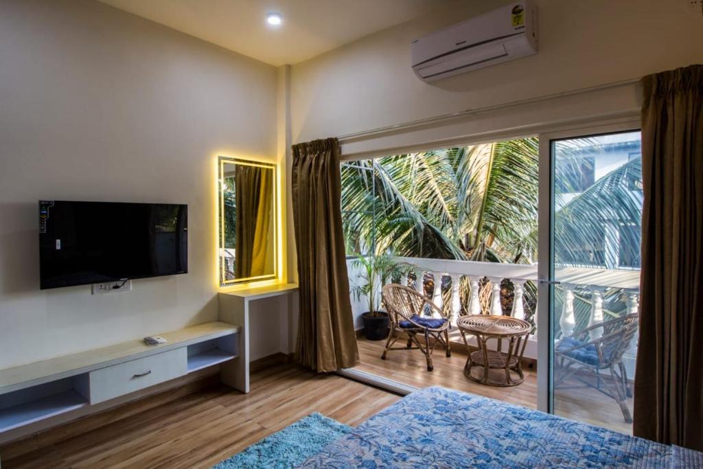 TV a/nebo společenská místnost v ubytování MERAKEe HOUSE