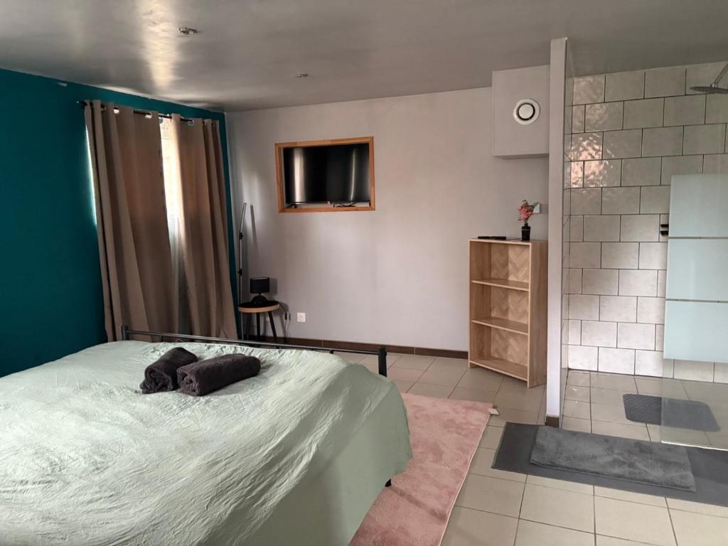 Postel nebo postele na pokoji v ubytování Studio erny