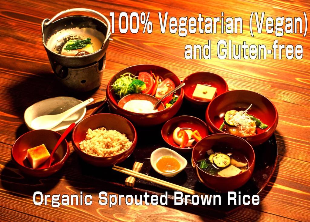 a group of bowls of food on a table at Yojokan Haru no Hikari in Hakone