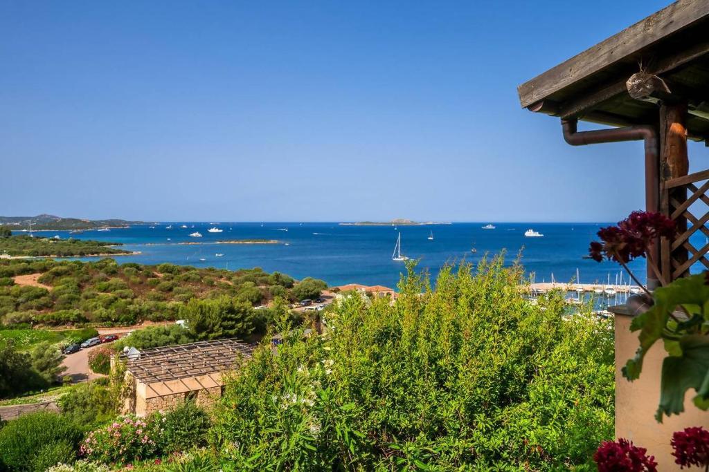 a view of the ocean from a house at Blue Skyline | Sea View Terrace in Portisco in Olbia