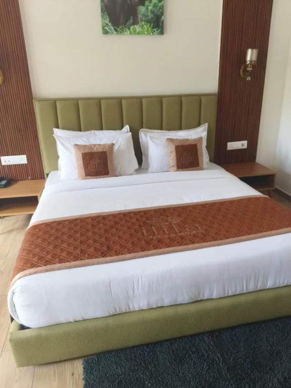 Postel nebo postele na pokoji v ubytování Creekwood Farmhouse Resort