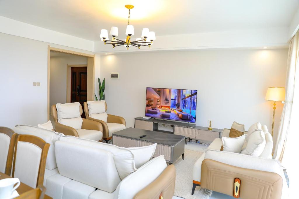 TV a/nebo společenská místnost v ubytování Park View Luxury Apartments