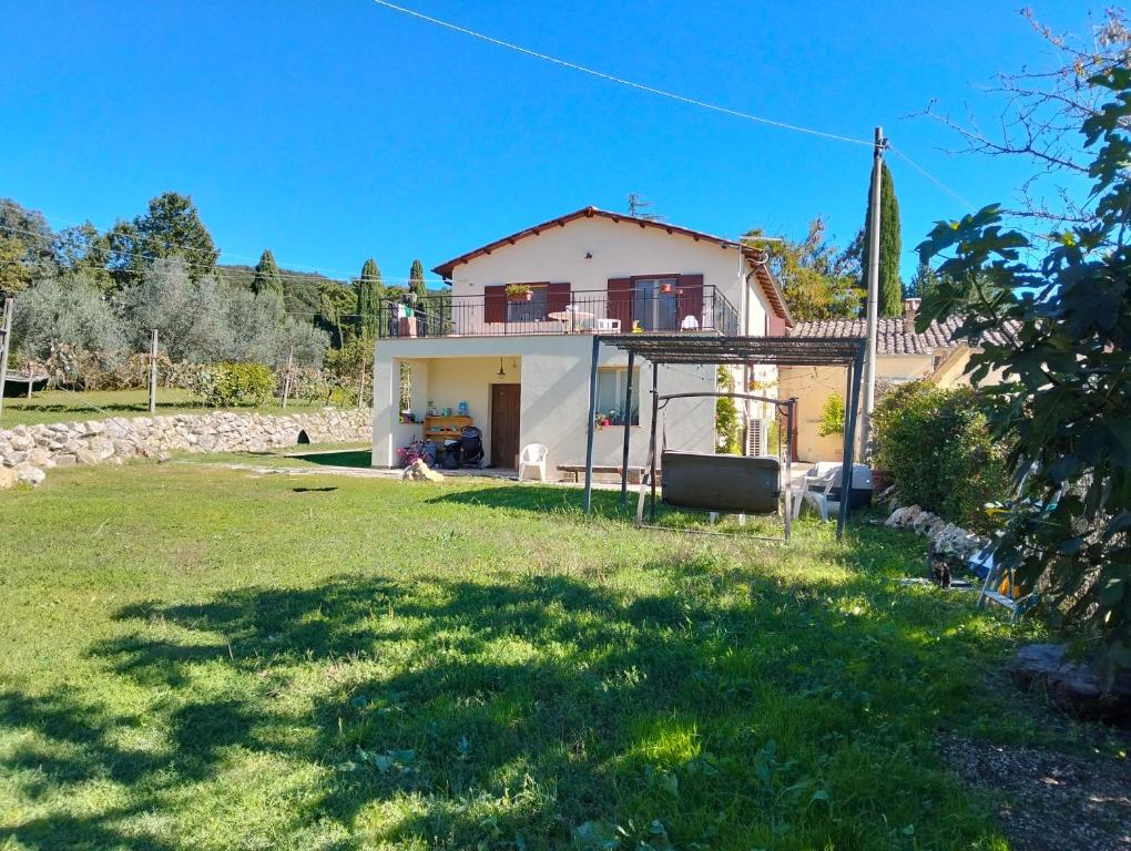 a house with a large yard in front of it at Casa 2C Amelia in Amelia