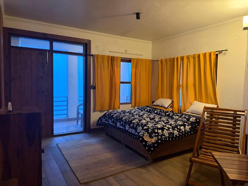 Postel nebo postele na pokoji v ubytování Green Ville by Stay Stories