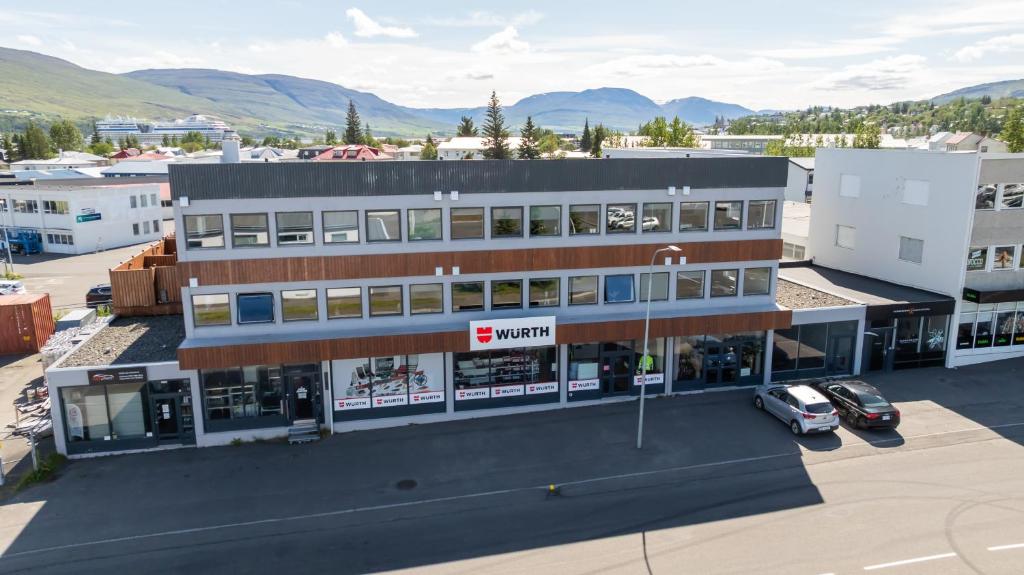 an overhead view of a building with a parking lot at LL Properties - TB24 The Boutique Flat in Akureyri
