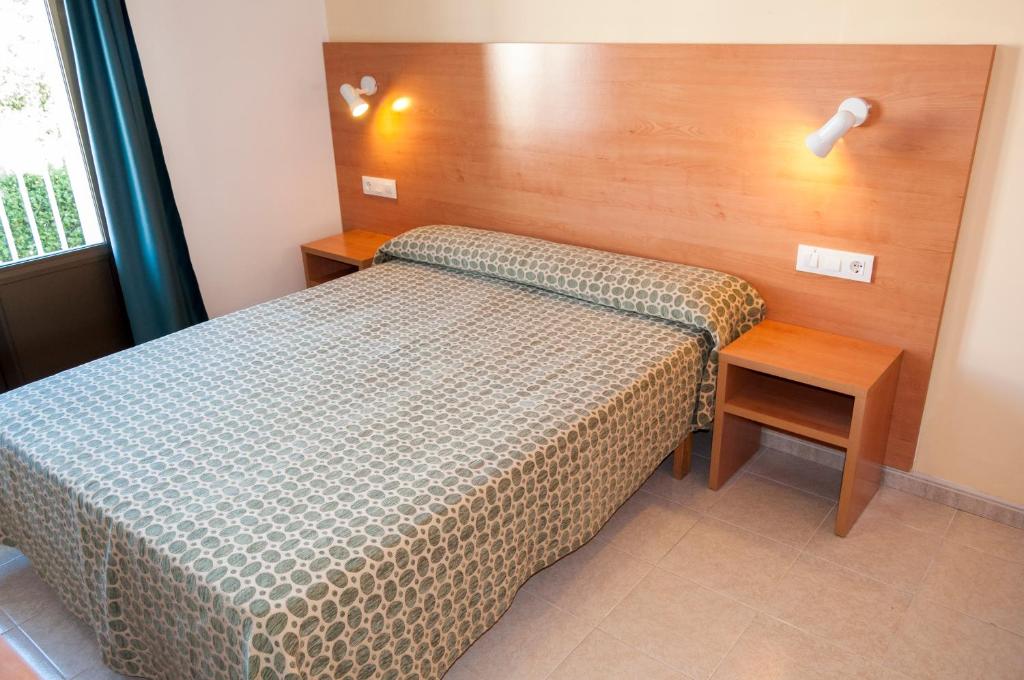 Postel nebo postele na pokoji v ubytování Hotel Madrid