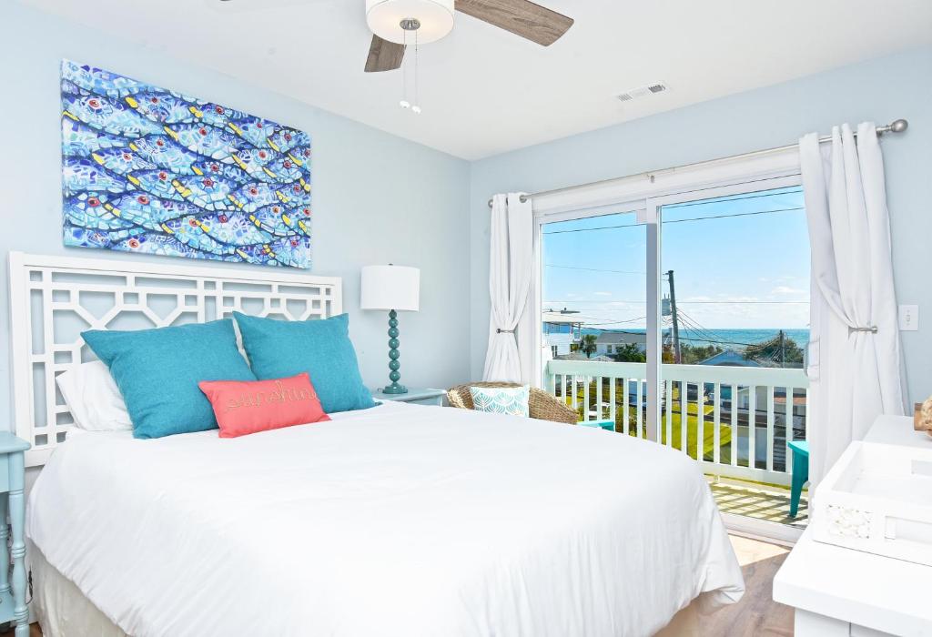 Postel nebo postele na pokoji v ubytování 5 Decks