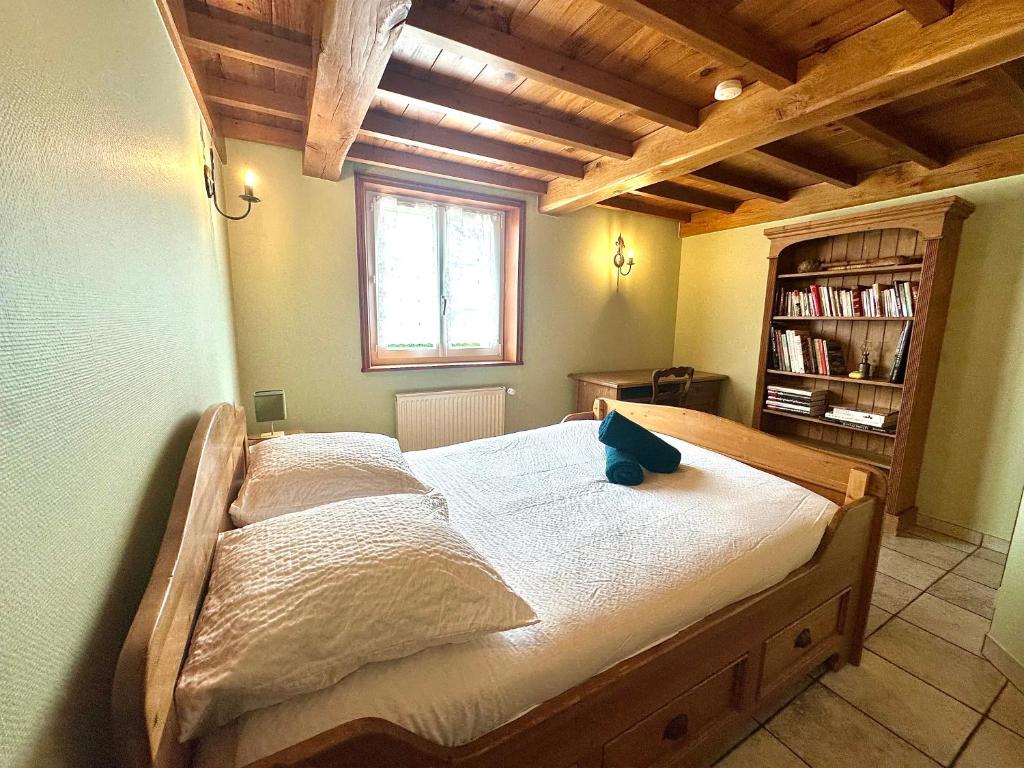 Postel nebo postele na pokoji v ubytování Le Chauffour