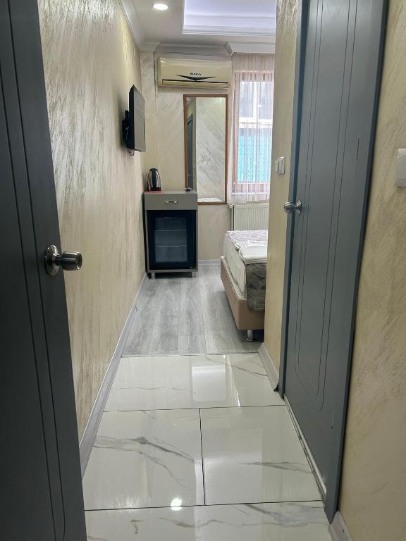 Giường trong phòng chung tại Grand Kybele Hotel