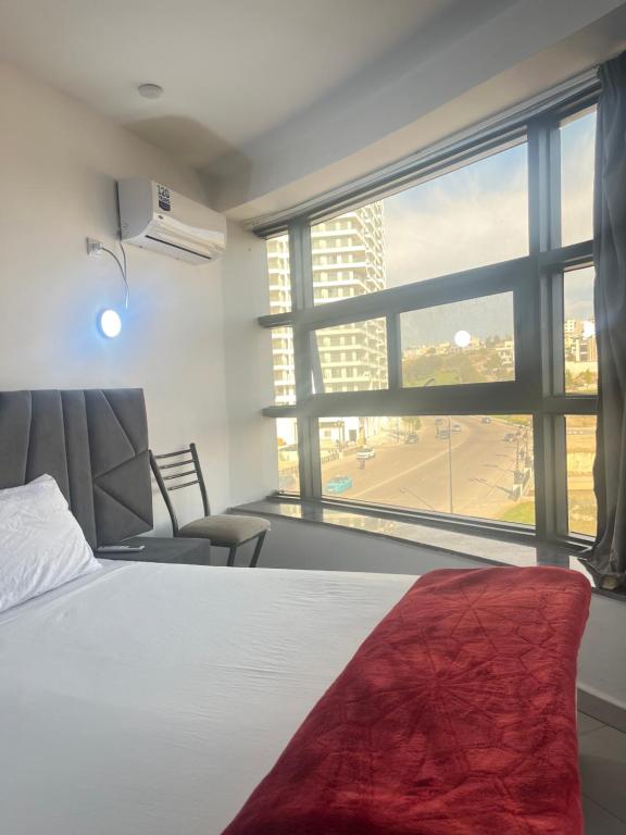 Una cama o camas en una habitación de Sunrise studio