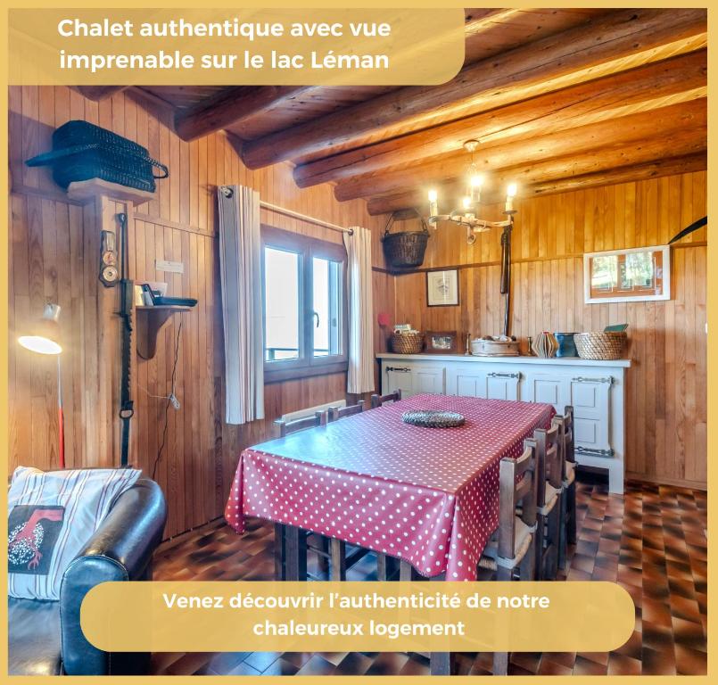 a dining room with a table and a kitchen at Le Chalet de Jacky I Vue Lac I Lugrin in Lugrin