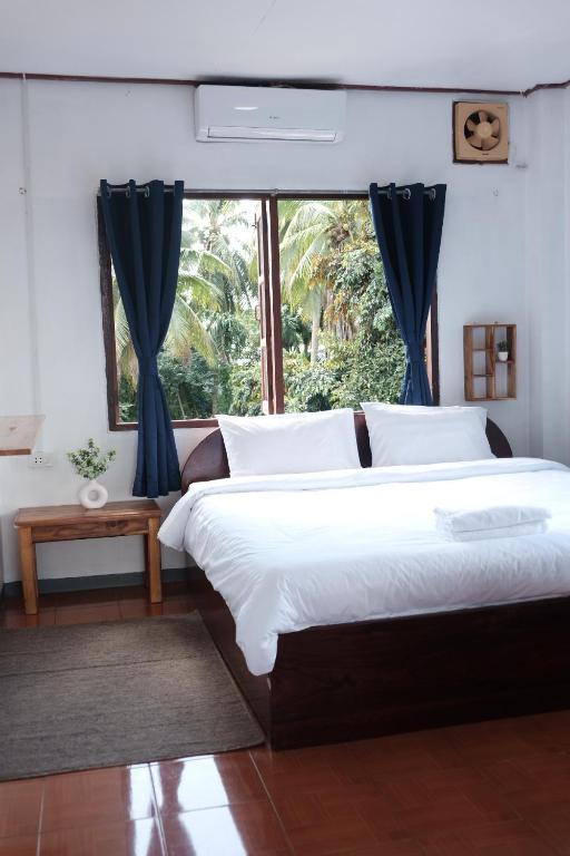 Katil atau katil-katil dalam bilik di Sabaydee Guesthouse