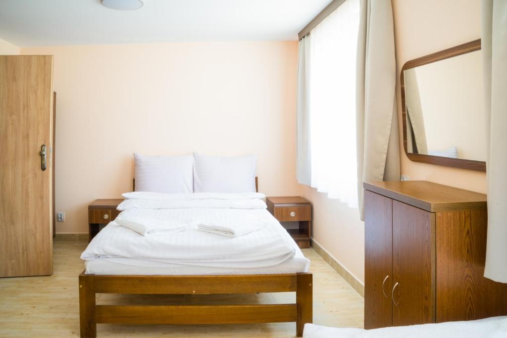 Posteľ alebo postele v izbe v ubytovaní ZGODA Kompleks Hotelarski