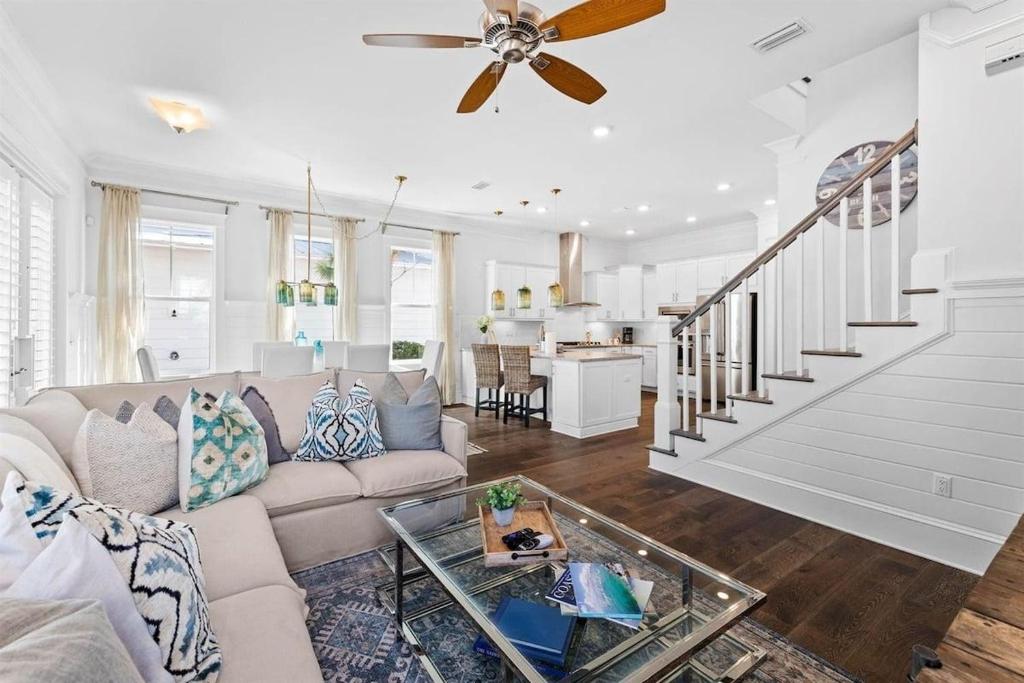 a living room with a couch and a table at It's a Shore Thing in Inlet Beach