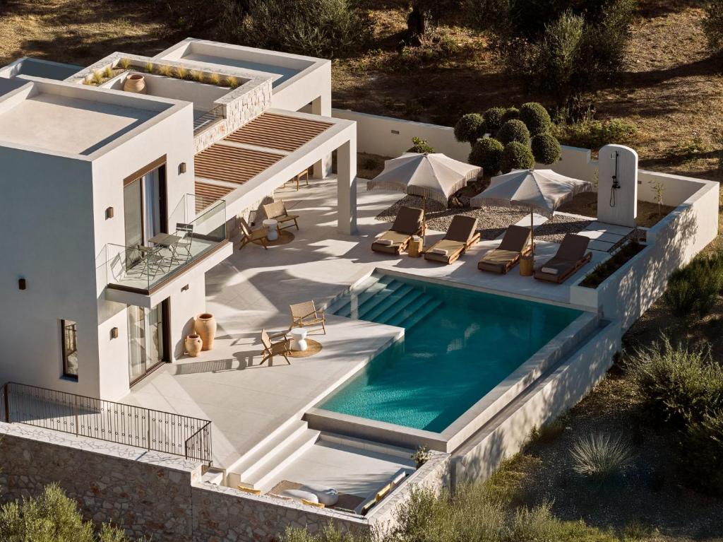 an aerial view of a house with a swimming pool at Alba d'Oro in Laganas