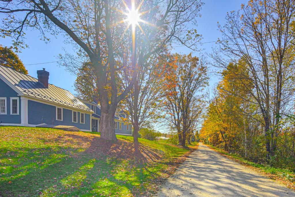 a house on a road in front of a house at Romantic, Secluded Vermont Getaway with Hot Tub in Hancock