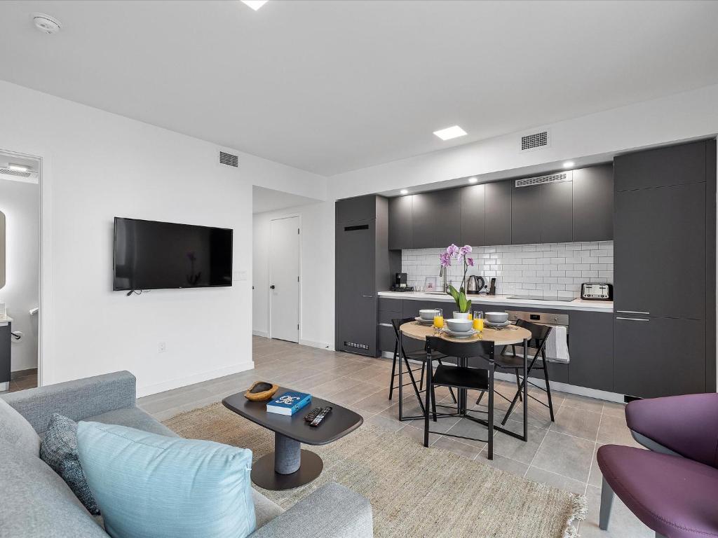 Televiisor ja/või meelelahutuskeskus majutusasutuses Miami Downtown Condos