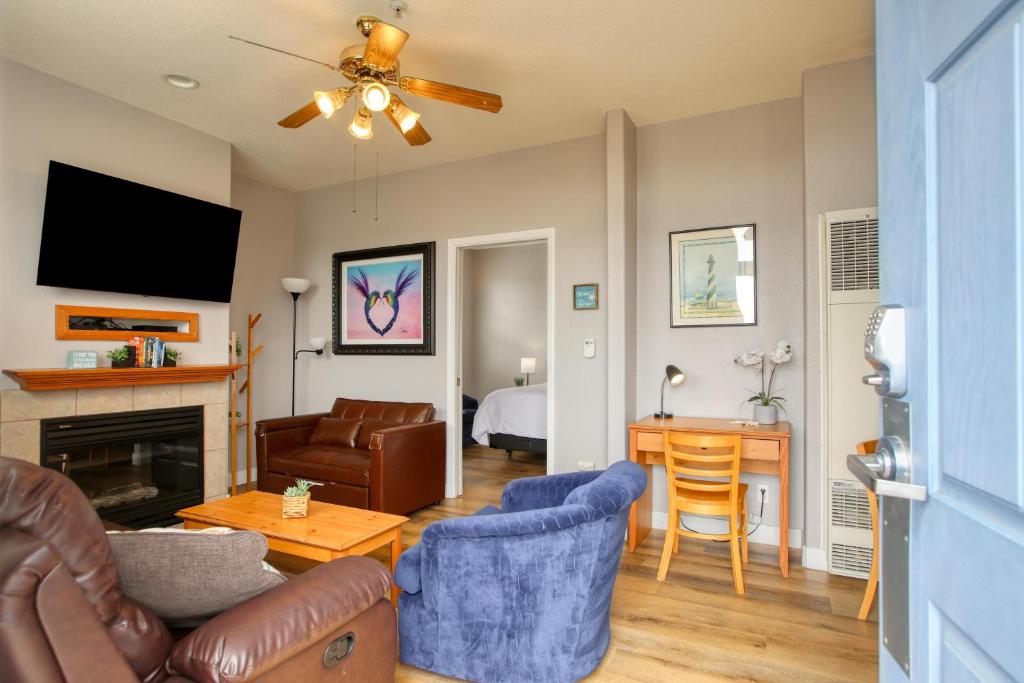 a living room with a couch and a table at Pacific Plaza #609 - Offshore Oasis - 1BdrmUp-K-FSofa in Oceano