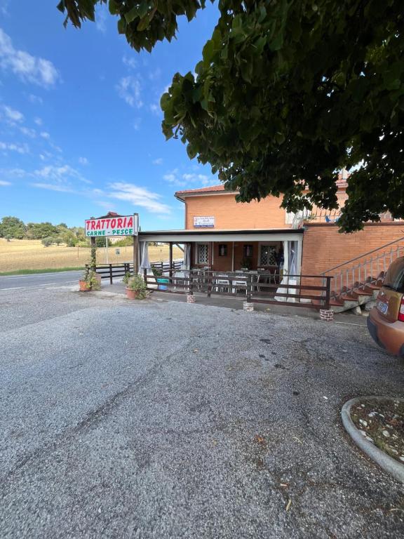 a building with a sign on the side of it at La Tana della Volpe B.&.B. in Montecassiano