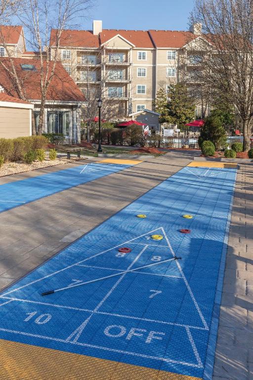 an empty street with a blue parking lot at Club Wyndham Branson at The Meadows in Branson