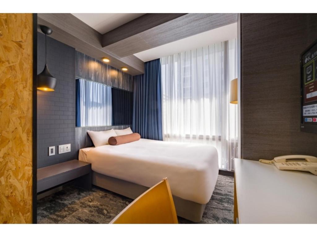 Una cama o camas en una habitación de Hotel Oak Shizuoka - Vacation STAY 23308v