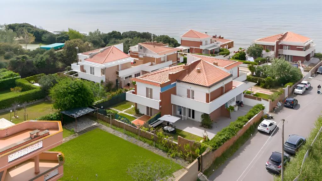 an overhead view of a house with a yard at VILLA LILLA Beachfront - Sea View with Parking and Private Garden in Anzio