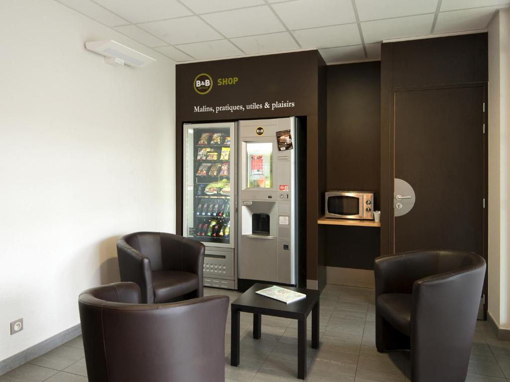 Posezení v ubytování B&B HOTEL Lyon Eurexpo Chassieu