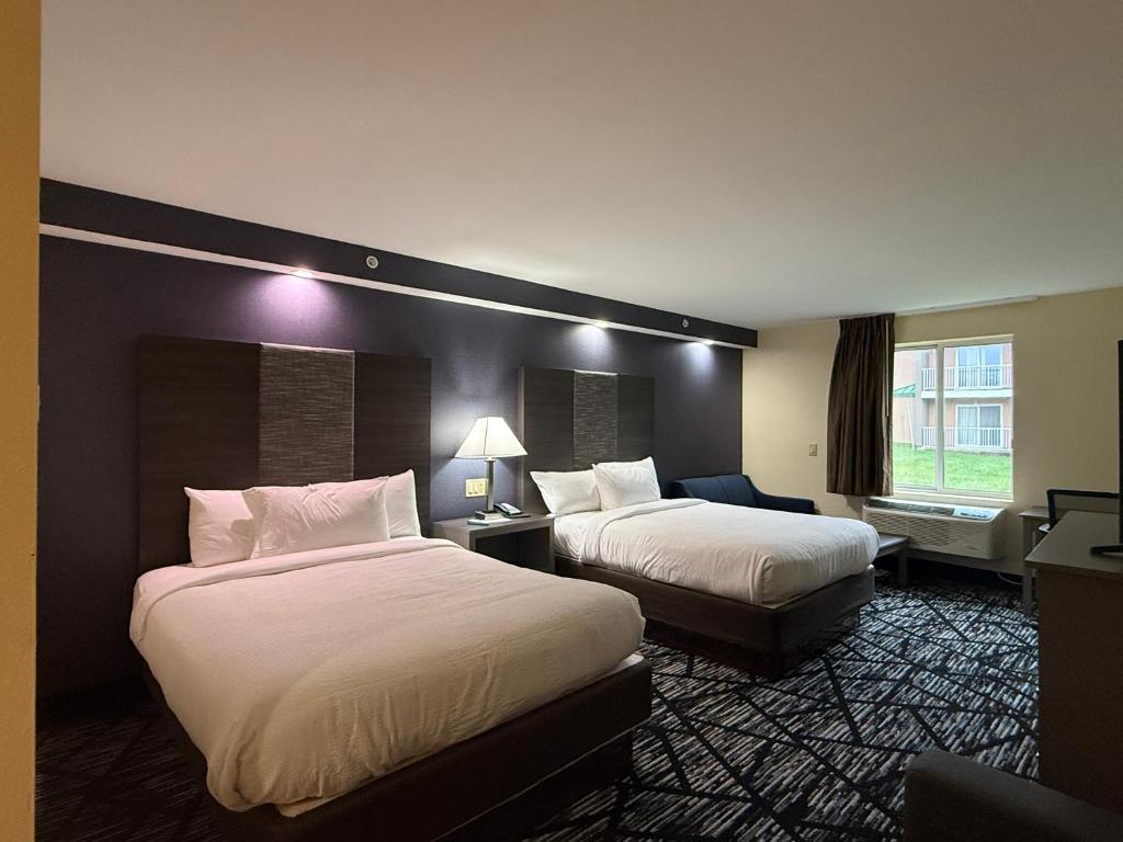 Ένα ή περισσότερα κρεβάτια σε δωμάτιο στο Plymouth Bay Inn