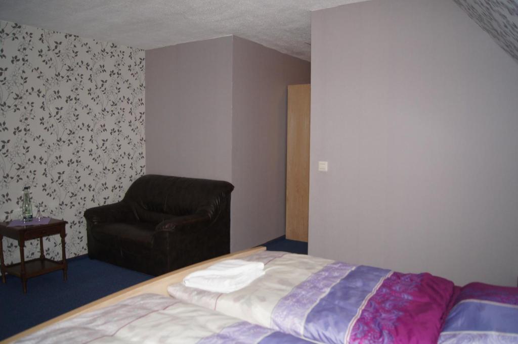 Postel nebo postele na pokoji v ubytování Hotel Draschwitz