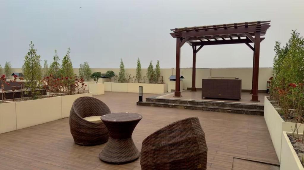 Balkón nebo terasa v ubytování Whispers of Gold - 1BHK - Zameen Aurum