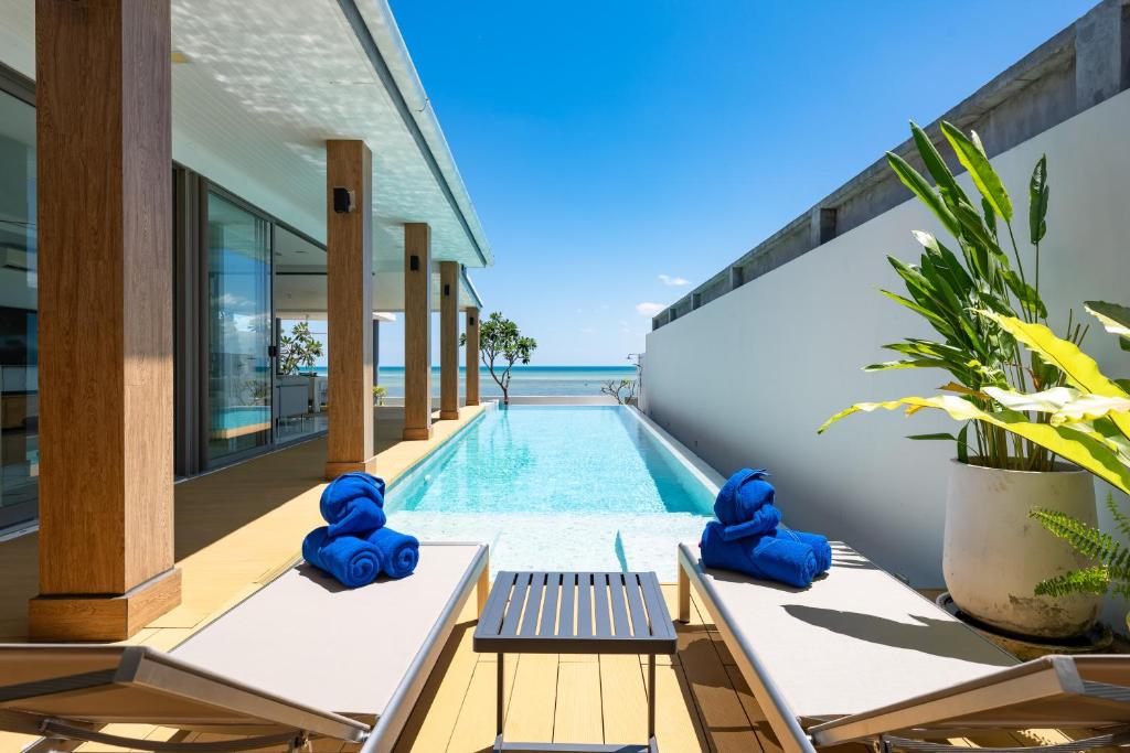 Πισίνα στο ή κοντά στο Villa Frangipani - Beachfront Oasis Private Pool