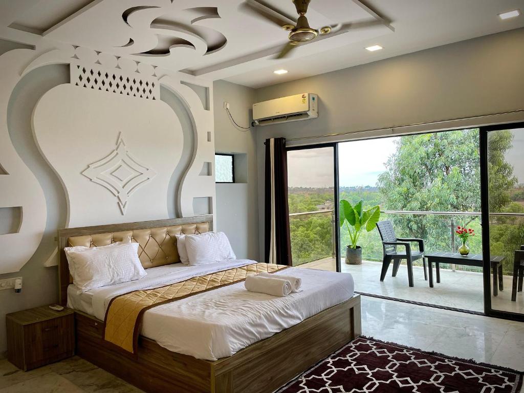 Ένα ή περισσότερα κρεβάτια σε δωμάτιο στο Mountain Breeze