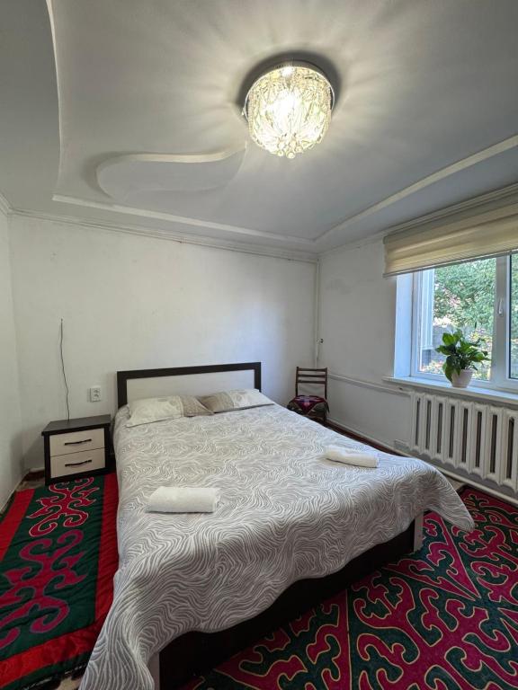 Katil atau katil-katil dalam bilik di Cozy Guest House