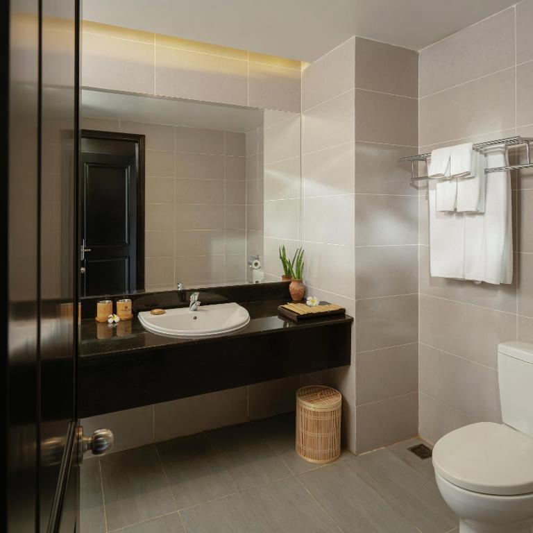 Phòng Deluxe 2 Giường Đơn Có Ban Công - Nhìn Ra Vườn
