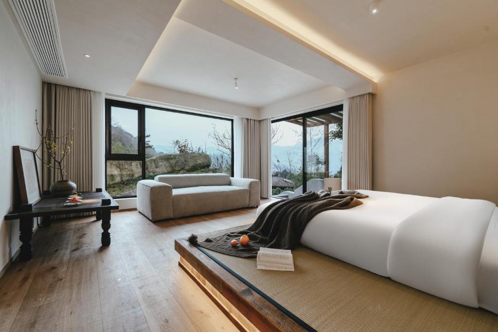 Postel nebo postele na pokoji v ubytování Anlan Creek Spring B&B