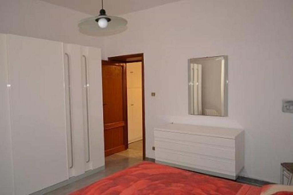 Postel nebo postele na pokoji v ubytování B&B l'Antropologo