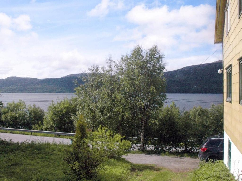 a view of a lake from the side of a house at 8 person holiday home in Åfarnes-By Traum in Årset